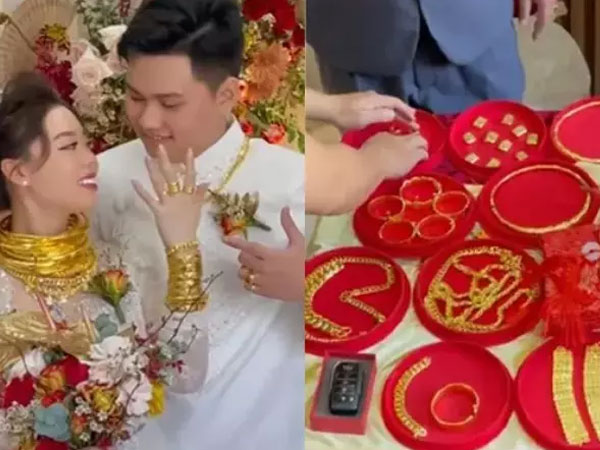 Cô dâu xinh đẹp vàng đeo kín người, sổ đỏ trang sức la liệt trên bàn