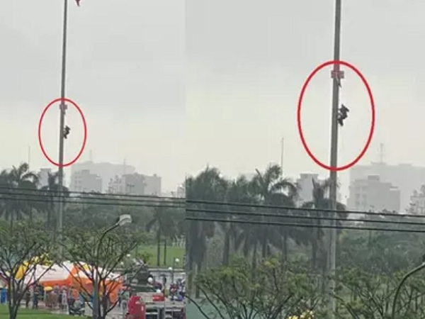Clip: Người đàn ông vắt vẻo trên cột cờ livestream, chuẩn bị tự sát