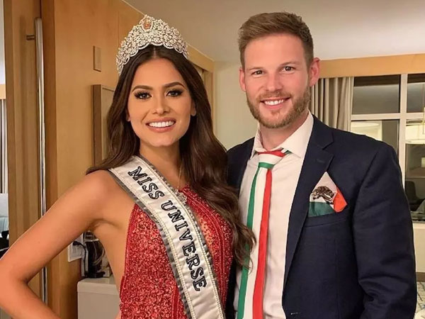 Miss Universe có bầu với phóng viên điển trai?