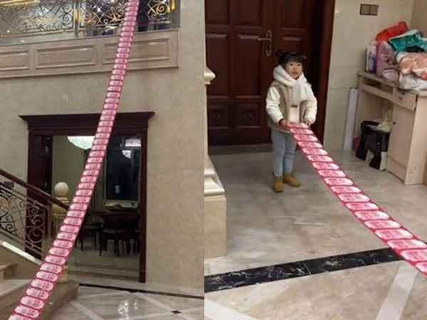 Bé gái 4 tuổi nhận được bao lì xì dài 13m theo cách siêu đặc biệt, biết số tiền dân mạng thi nhau 'xin vía'