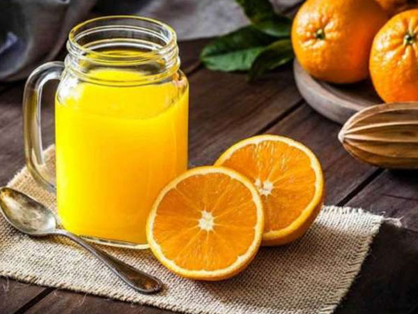 Có nên uống nước cam trước khi ăn?