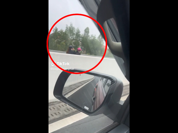 Clip: Người đi đường hốt hoảng với hai chị em điều khiển xe máy ngược chiều trên cao tốc