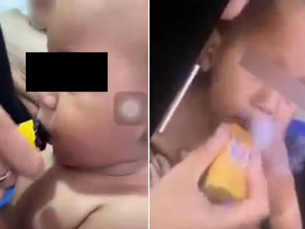 Mẹ cười thích thú khi con trai 11 tháng tuổi ho sặc sụa vì bị ép hút thuốc lá điện tử