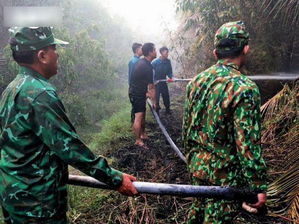 Rừng tràm bị cháy nghi do người dân làm ruộng đốt gốc rạ