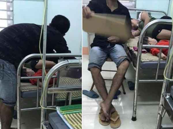 Ấm lòng cảnh đưa vợ bầu đi viện, chồng một tay bóp chân, một tay quạt cho vợ ngủ