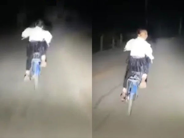 Có lòng tốt soi đèn giúp em nhỏ đạp xe về khuya, tài xế liền cười trừ trước phản ứng bất ngờ của cô bé
