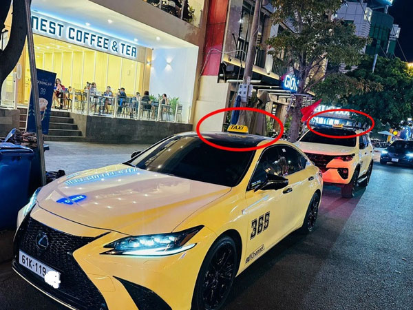 Hàng loạt xe hạng sang gắn mào taxi diễu phố gây phản cảm
