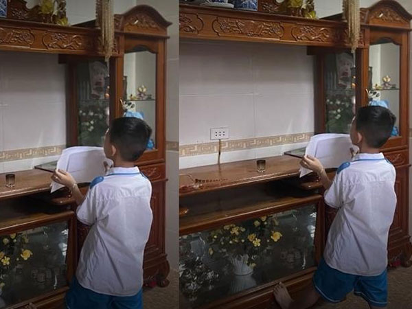 Vừa nhận giấy khen ở trường trở về, bé trai nhìn lên di ảnh bố nói một câu khiến ai cũng xúc động