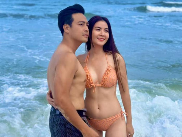 Kha Ly 'thiêu đốt' mọi khung hình nhờ diện bikini cực cháy, body vạm vỡ của ông xã chiếm spotlight