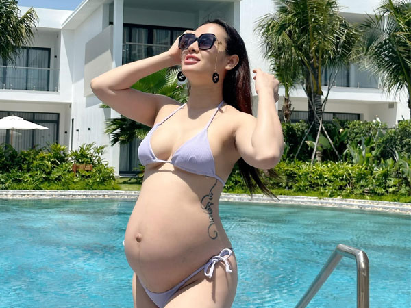 Bất chấp tranh cãi, Phương Trinh Jolie vẫn tự tin diện bikini bé xíu khoe bụng bầu 'vượt mặt' những ngày cuối thai kỳ