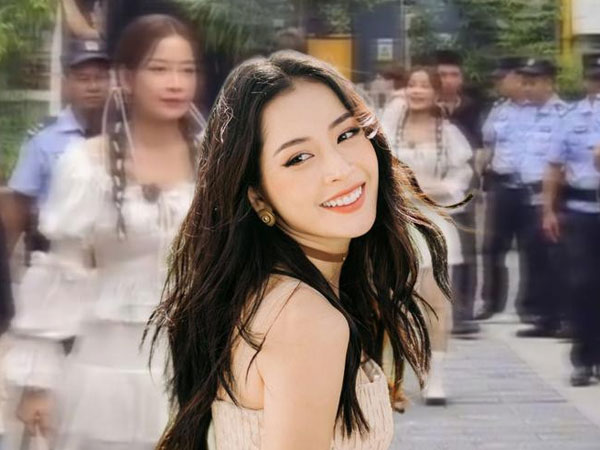 Chi Pu gây xôn xao khi được dàn vệ sĩ hùng hậu hộ tống trên đường phố Trung Quốc