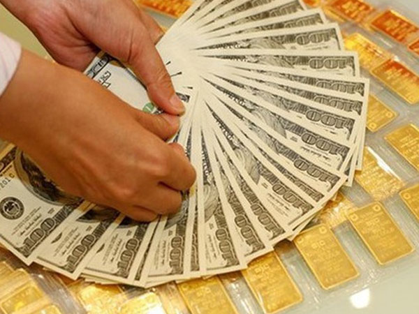 Giá vàng tiếp tục tăng, USD chững lại