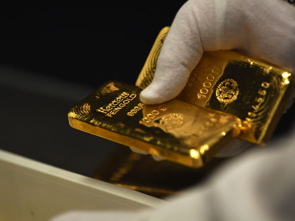 Giá vàng hôm nay 12.9: USD tăng, vàng mắc kẹt