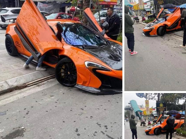Camera vụ siêu xe McLaren 650s gặp nạn, nằm bên vỉa hè Hà Nội