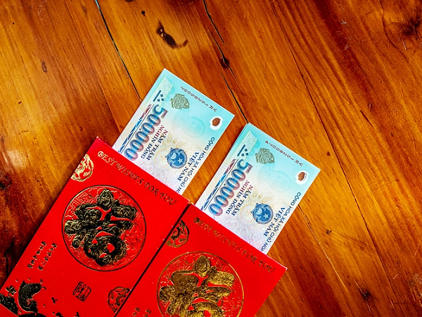 Đổi tiền mới dịp Tết Nguyên đán nhộn nhịp trên chợ mạng với chênh lệch lớn, người đổi coi chừng mất tiền oan