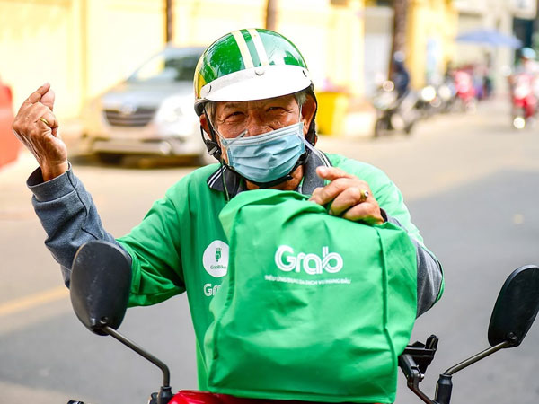 Grab lần đầu có lãi