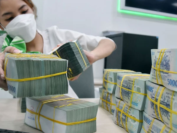 Ngân hàng trầy trật với nợ xấu