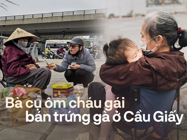 Nước mắt phía sau bức ảnh bà cụ bán trứng ôm bé gái ở ngã tư Cầu Giấy