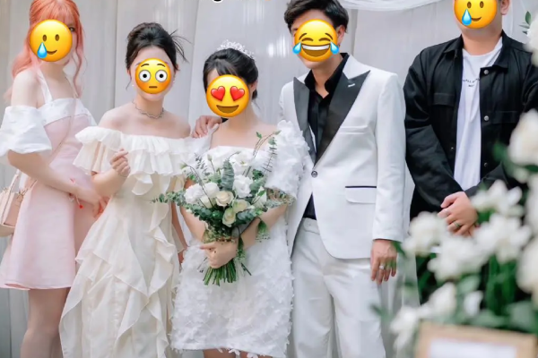 Vụ đi đám cưới mặc váy trắng, cầm hoa chụp với chú rể như cô dâu bị 'ném đá': Người trong cuộc nói lý do!