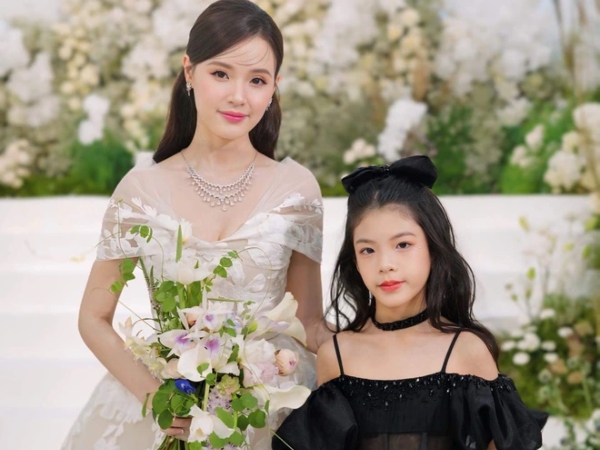 Xuất hiện 1 'thiên thần nhỏ' tại đám cưới Midu, profile cũng đỉnh không ngờ