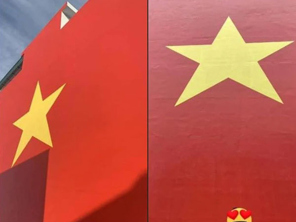 Sự thật về thông tin 'người dân bị yêu cầu xóa hình cờ Tổ quốc sơn trên tường'