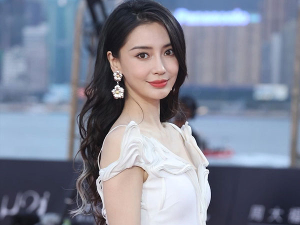 Angelababy tháo chạy về quê