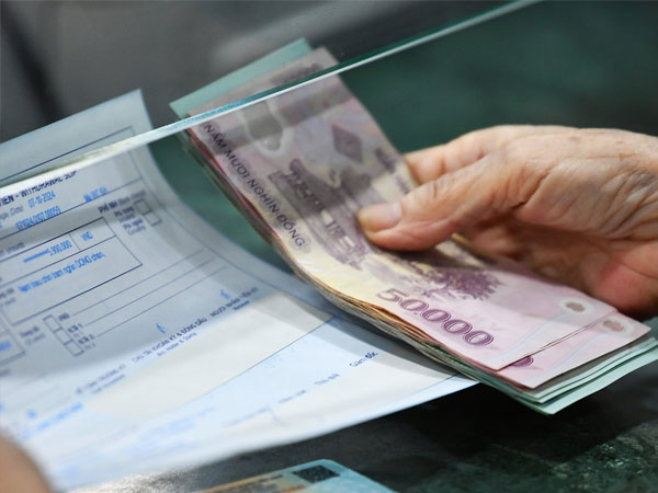 Trả gộp 2 tháng lương hưu trước Tết, có người nhận hơn 320 triệu đồng