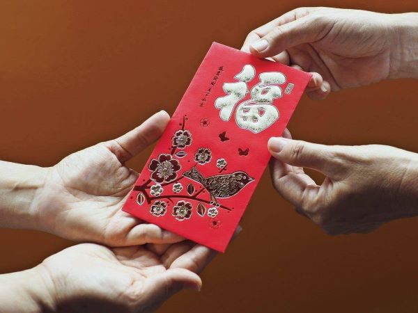 Lì xì có nghĩa là gì? Nguồn gốc, ý nghĩa phong tục lì xì ngày Tết