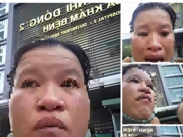 Người phụ nữ ôm con khóc cầu cứu trước bệnh viện yêu cầu dừng chuyển tiền hỗ trợ