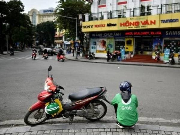 Bất chấp sức ép từ Xanh SM và Be Group, Grab công bố doanh thu tại Việt Nam tăng gấp đôi sau 2 năm, lên gần 6.000 tỷ đồng