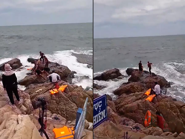 Ra mỏm đá trước biển chụp ảnh cưới, cô dâu bị sóng cuốn trôi, chú rể ngồi im nhìn người khác cứu