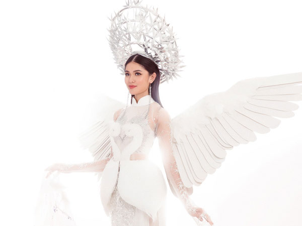 Thùy Dung mặc váy con cò thi trang phục truyền thống tại Miss International
