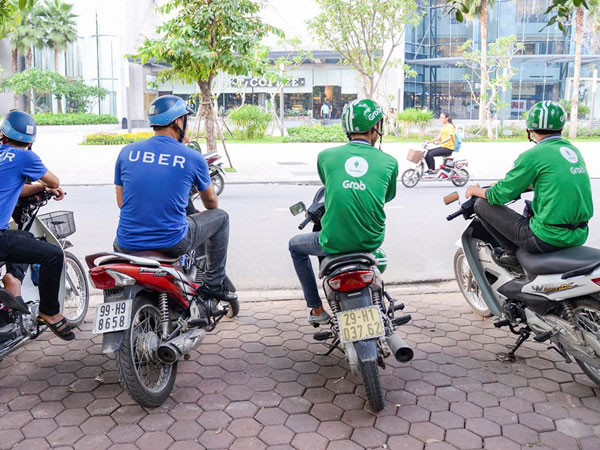 'Tuần trăng mật' của Uber, Grab với tài xế đã kết thúc?