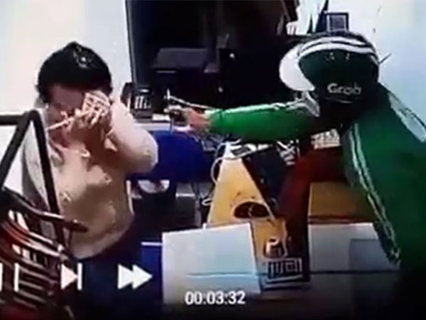 Sự thật bất ngờ về clip tài xế Grab xịt hơi cay nhân viên shop quần áo, cướp tiền