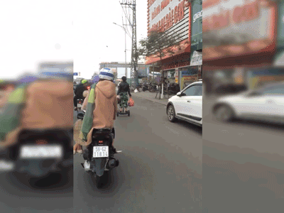 Video: Người phụ nữ U50 cưỡi xe thăng bằng lướt vèo vèo trên phố