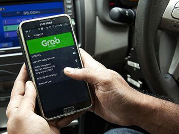 Nỗi lo Grab thao túng giá taxi khi không còn Uber