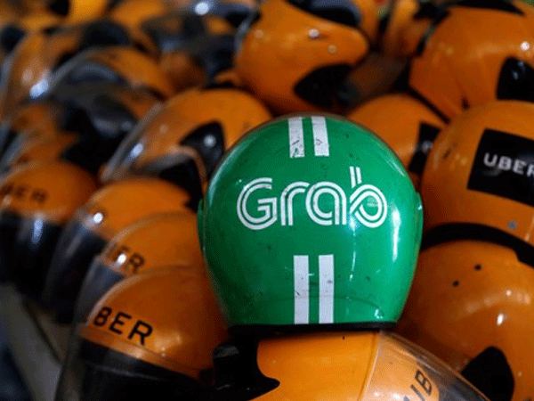 Số phận thương vụ 'bán mình' của Uber cho Grab sẽ ra sao?