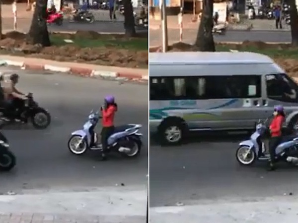 Người phụ nữ thản nhiên dừng xe nghe điện thoại giữa đường ngược chiều