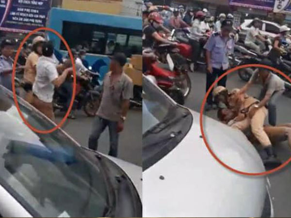Hà Nội: Cảnh sát giao thông quật ngã lái xe taxi giữa phố