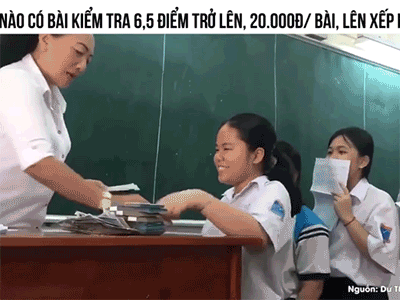 Cô giáo thưởng cả cọc tiền 20.000 đồng cho học sinh có bài kiểm tra trên 6,5 điểm