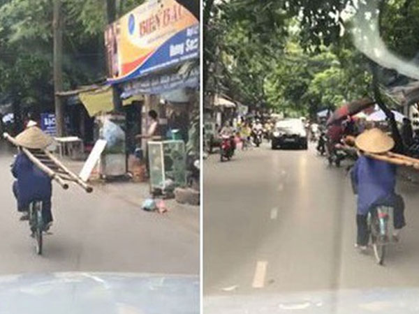 Clip: Người phụ nữ tròng thang vào cổ, vô tư đạp xe như 'diễn xiếc' trên phố khiến nhiều người thót tim