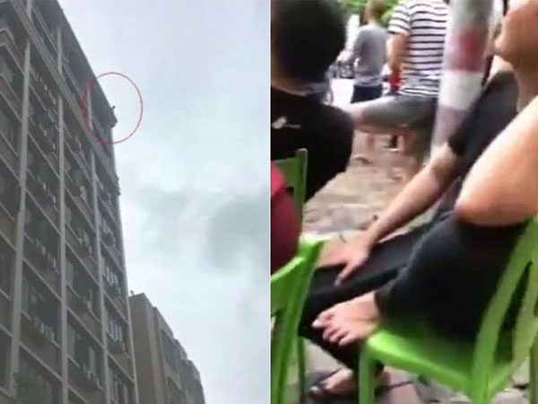 Trung Quốc: Đám đông mang ghế nhựa ra ngồi xem thanh niên định nhảy lầu tự tử suốt 3 giờ