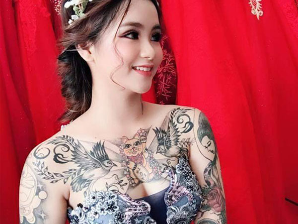Chuyện đằng sau bức ảnh thiếu nữ diện váy cưới khoe hình xăm Doraemon, Nobita gây tranh cãi