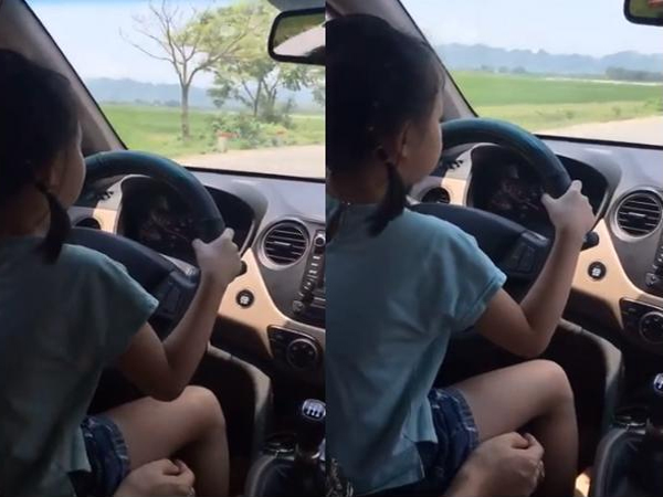 Bố cho con gái nhỏ cầm lái ô tô, mẹ quay phim khen 'lái xe siêu thế' khiến cư dân mạng bức xúc