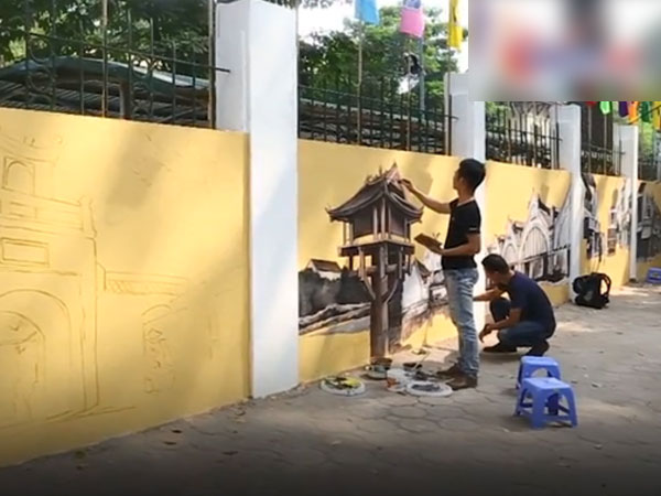 Video Hà Nội cổ kính đẹp mê mẩn qua 'phố bích họa' trên đường Phan Đình Phùng