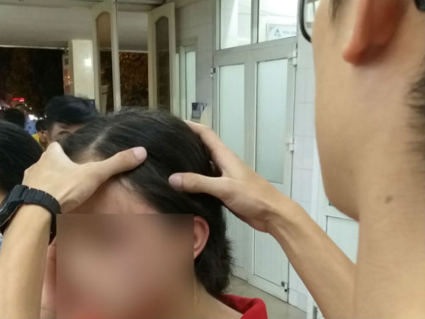 Hà Nội: Nữ sinh lớp 9 tố bị vợ hai của bố đập đầu, đánh tới mức phải nhập viện