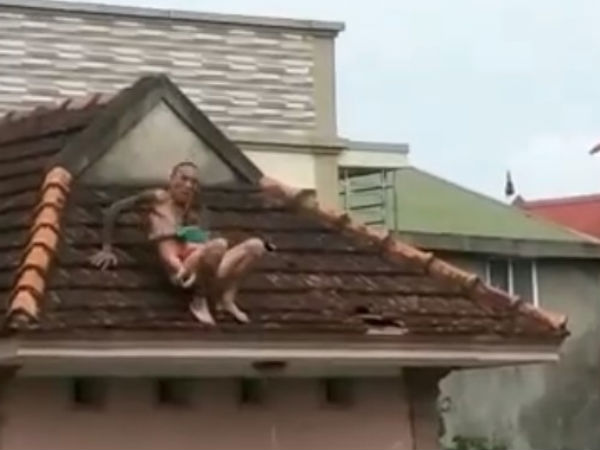Vụ gã đàn ông thả bé trai hơn 1 tuổi từ mái nhà xuống: Cháu bé được đỡ kịp thời, nghi là con của đối tượng