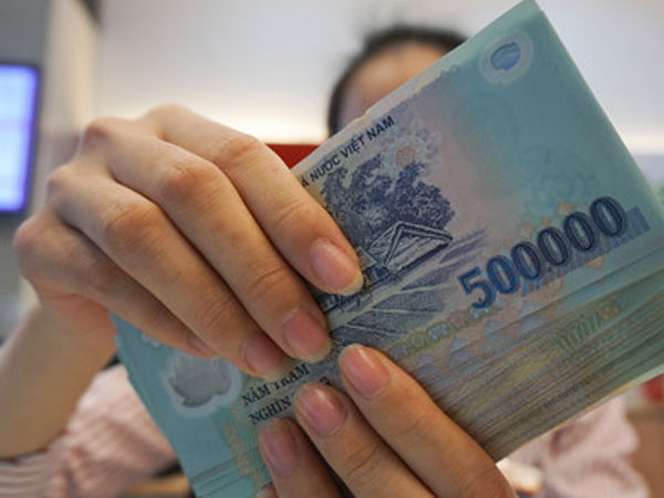 Nhận thưởng Tết phải đóng bao nhiêu tiền thuế?