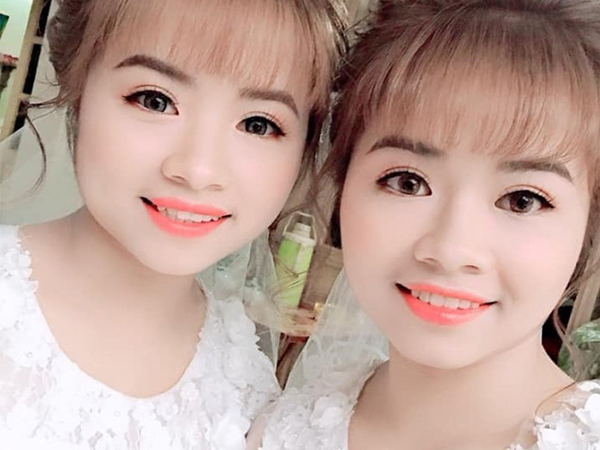 Cặp chị em sinh đôi làm cùng công ty, lấy chồng cùng một ngày nhận nhiều chú ý trên MXH
