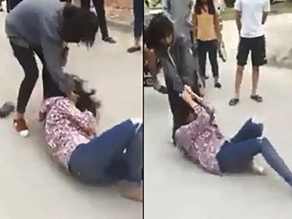 2 cô gái đánh nhau, gọi bạn trai và bố đến can thiệp